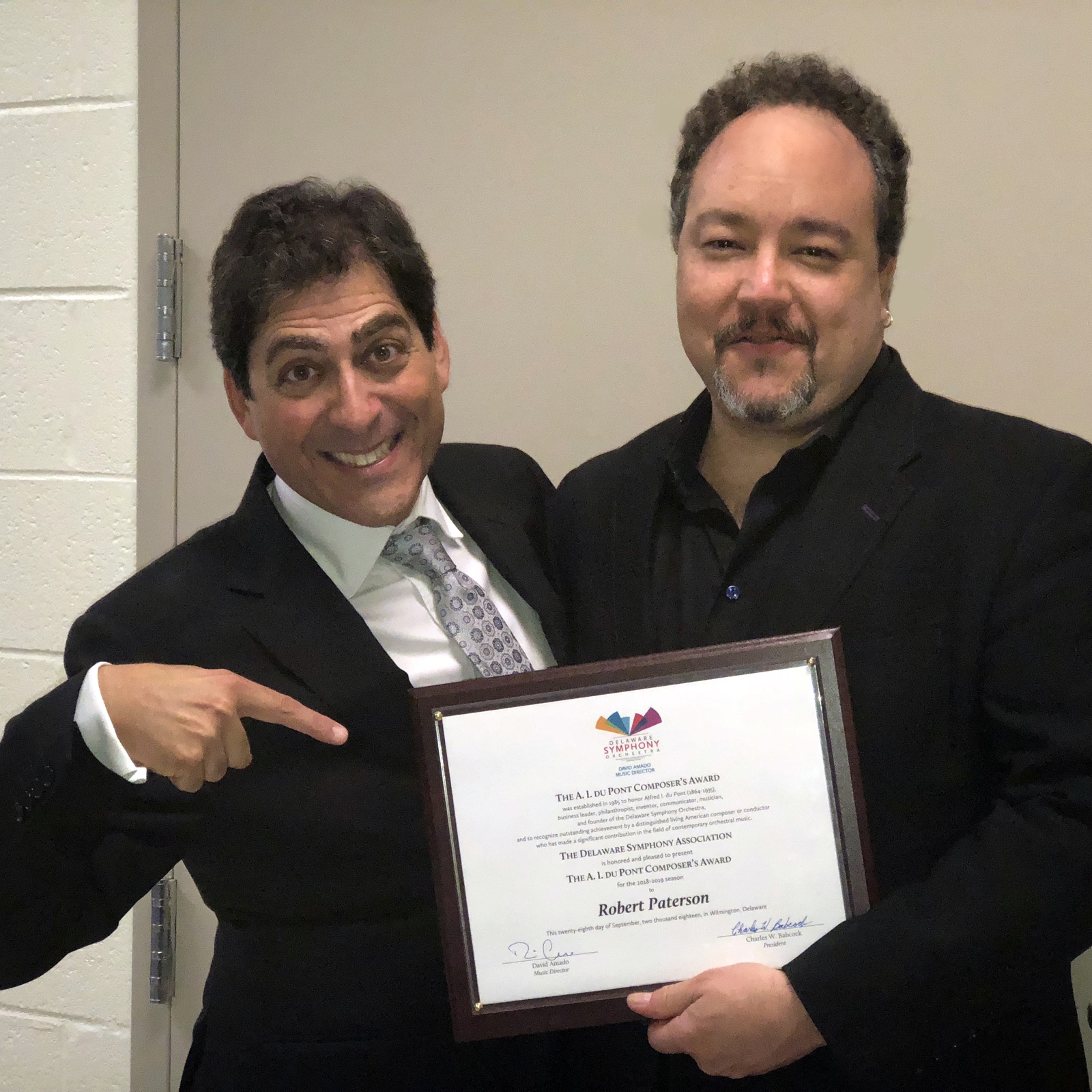 Robert Paterson receiving the Delaware Symphony's Alfred I. du Pont Composer's Award
